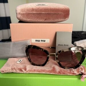 Miu Miu tortoise cat eye sunglasses